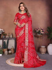 Experience Timeless Elegance With Our Purple Pure Handmade Bandhej Dola Silk Saree